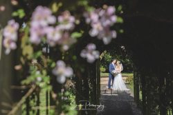swancar farm country house wedding photography bride groom in gardens flowers